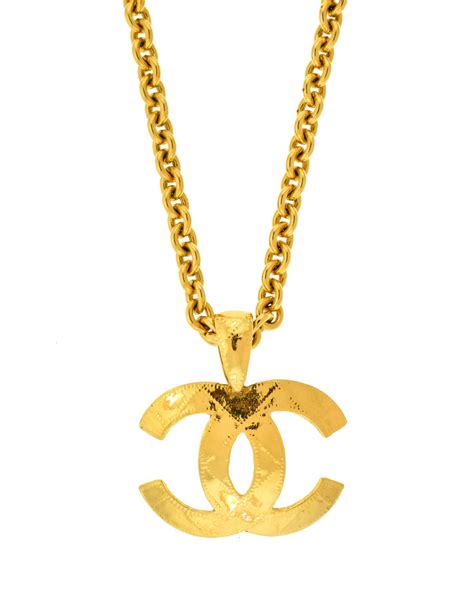 chanel pendant for shirt|Chanel pendant for clothes.